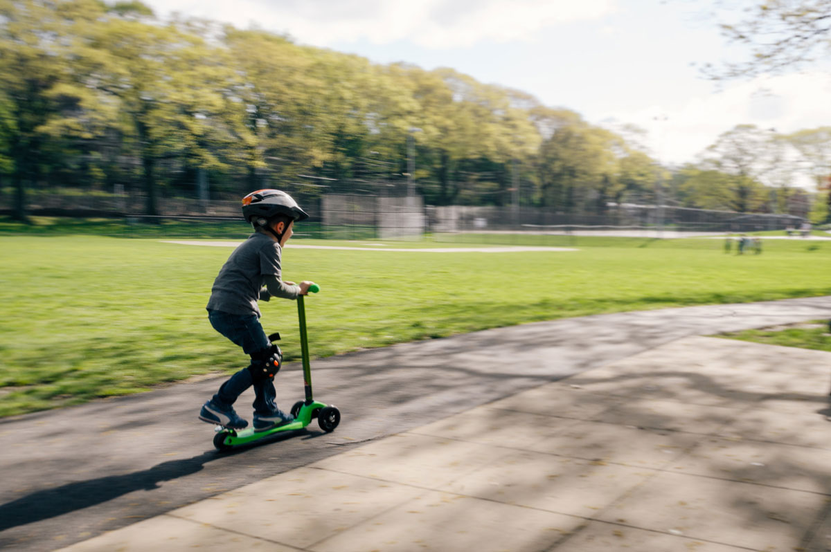a child on a scooter